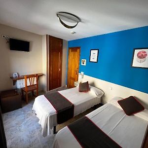 Habitación con 2 Camas Individuales